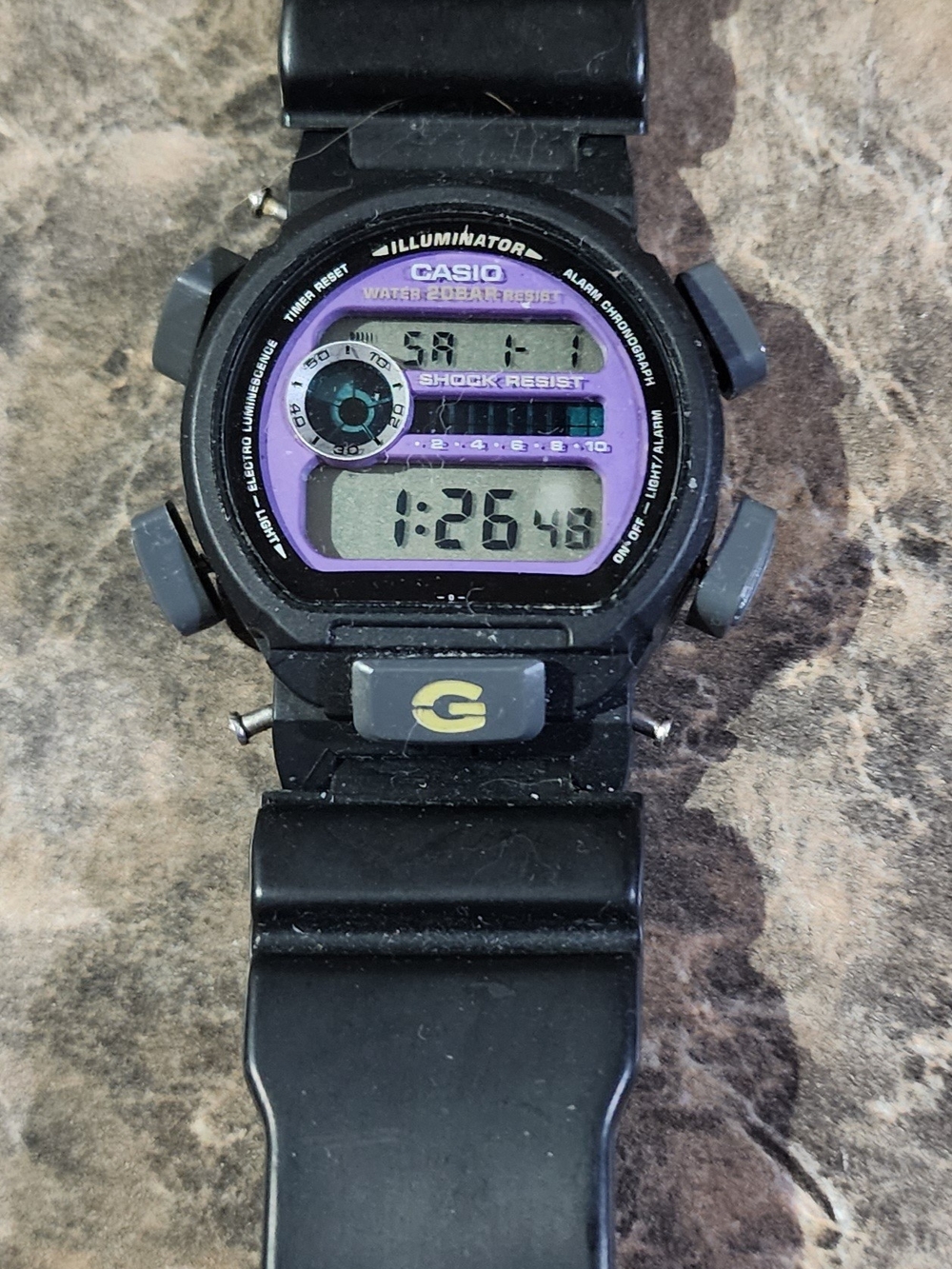 Casio G-Shock DW-9052 variant, featuring a distinct purple